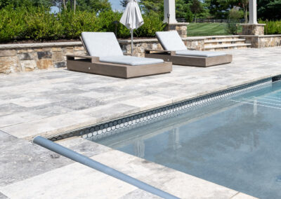 silver travertine detail of corner of pool