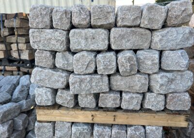 Buff cobblestones on pallet