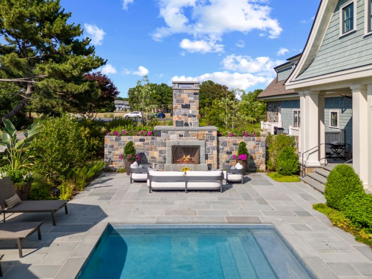 Stone Pool Deck & Outdoor Fireplace in Maryland